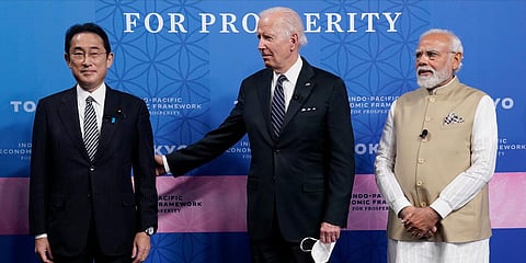 Japanese PM Fumio Kishida (L), US President Joe Biden and PM Narendra Modi arrive at the Indo-Pacific Economic Framework for Prosperity launch event in Tokyo. (Photo| AP)