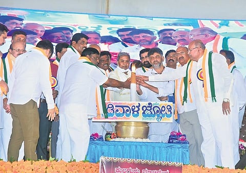 CLP leader Siddaramaiah, KPCC chief DK Shivakumar and other Congress leaders at the Madivala community event in Tumakuru on Sunday | Express