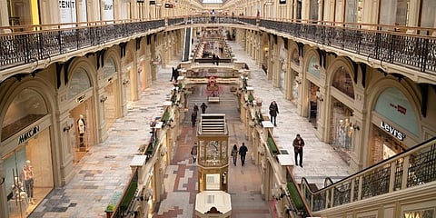 Few visitors walk inside the GUM department store in Moscow, in Moscow, Russia. (Photo | AP)