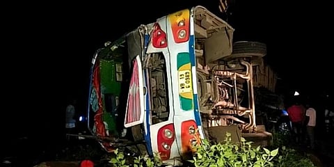 The ill-fated bus near Durgaprasad in Odisha's Ganjam district. (Photo| EPS)