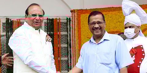 Delhi's new Lieutenant Governor Vinai Kumar Saxena (L) with CM Arvind Kejriwal (Photo| ANI)