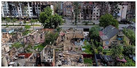 Damaged buildings ruined by attacks are seen in Irpin, on the outskirts of Kyiv, Ukraine, Thursday, May 26, 2022.