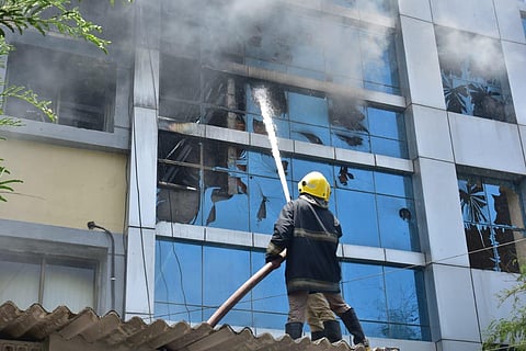 Fire and Rescue Services personnel fighting the fire at Green Bawarchi in Raidurgam, Hyderabad on May 28, 2022. (Photo | Vinay Madapu)