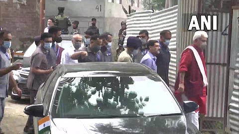 J&K Lieutenant Governor Manoj Sinha & IGP Vijay Kumar reach TV artist Amreen Bhat's residence who was fired upon by terrorists in Chadoora, Budgam on Sunday.