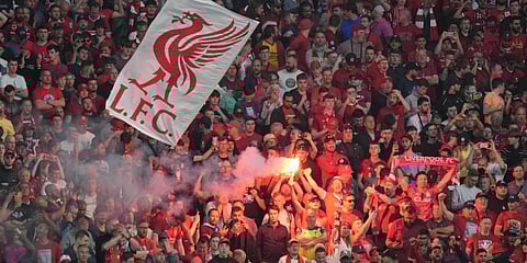 Liverpool fans light flares prior to the start of the Champions League final between Liverpool and Real Madrid at the Stade de France in Saint Denis near Paris, Saturday, May 28, 2022.(Photo | AP)