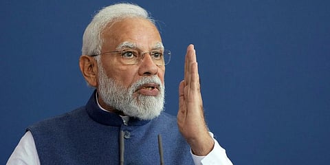 PM Narendra Modi addresses the media during a joint press statement as part of a meeting with German Chancellor Olaf Scholz at the chancellery in Berlin, Germany. (Photo | AP)