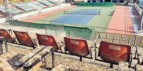 Seats inside the Nungambakkam tennis stadium with bird droppings on them. TNTA president, Vijay Amritraj, has said they will spruce up the whole stadium including redoing of seats soon | Express