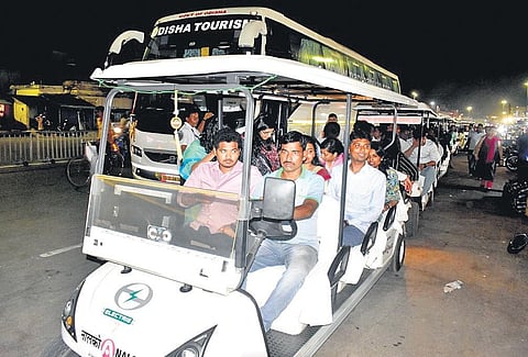 IAS probationers being ferried to the Shri Jagannath temple on battery-operated vehicles meant for senior citizens, the ailing people and PwDs. (Photo | Ranjan ganguly, EPS)