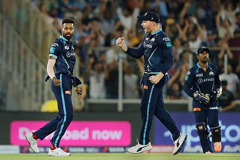 Hardik Pandya of Gujarat Titans celebrates the wicket of Jos Butler of Rajasthan Royals during the final T20 cricket match of the Indian Premier League 2022. (Photo | PTI)