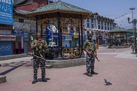 Paramilitary soldiers keep vigil with the help of a drone during shutdown in central Srinagar. (Photo | AP)