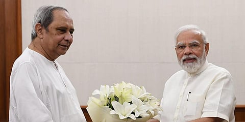 Odisha CM Naveen Patnaik in discussion with Narendra Modi in New Delhi. (Photo| Twitter)