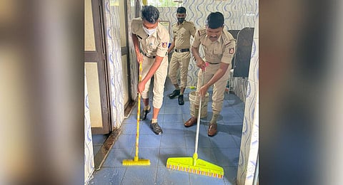 The video of the SI cleaning the toilet has gone viral. (Photo | Express)