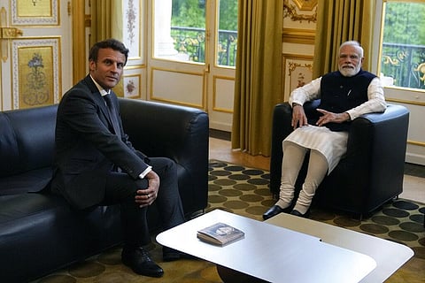 French President Emmanuel Macron, left, meets Indian Prime Minister Narendra Modi, right, at the Elysee palace in Paris, Wednesday, May 4, 2022. (Photo | AP)
