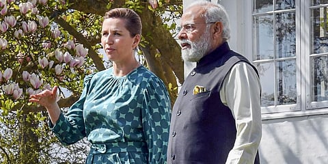 PM Narendra Modi interacts with Danish counterpart Mette Frederiksen, at her residence in Copenhagen, Denmark. (Photo | PTI)