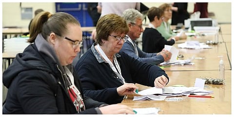 Ballot papers are counted at Peterborough Arena, for the local government elections, in Peterborough, England, Thursday, May 5, 2022. (Photo | AP)