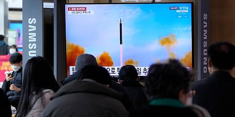 People watch a TV showing a file image of North Korea's missile launch during a news program at the Seoul Railway Station in Seoul. Image used for representational purpose only. (File Photo | AP)