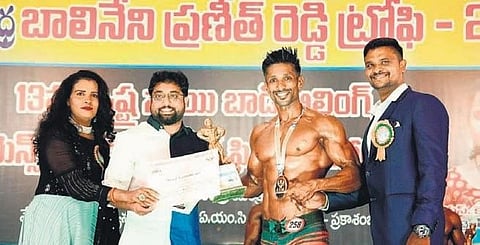 S Praveen poses after winning a bodybuilding contest in Chittoor district. (Photo | ESP)