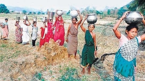 Tribals of Rimpi village in Meliyaputi mandal walk long distances to get drinking water.(Photo | EPS)