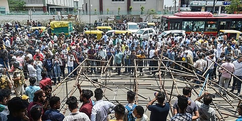 Locals stage a protest during an anti-encroachment drive by Municipal Corporation of Delhi, at Shaheen Bagh .(Photo | PTI)