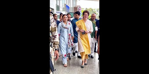 AICC General Secretary Priyanka Gandhi arrives for 'Nav Sankalp Karyashala' of Uttar Pradesh Congress Committee, in Lucknow, Wednesday.(Photo | PTI)