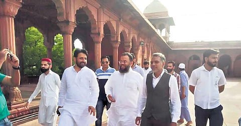 DWB Chairman Amanatullah Khan along with the Director of National Trust for Art and Cultural Heritage and Waqf Board officials inspect the site | Express