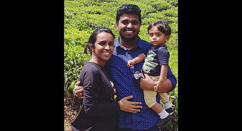 Sanju with wife Kukku Ann Jacob and son Josiah | Express