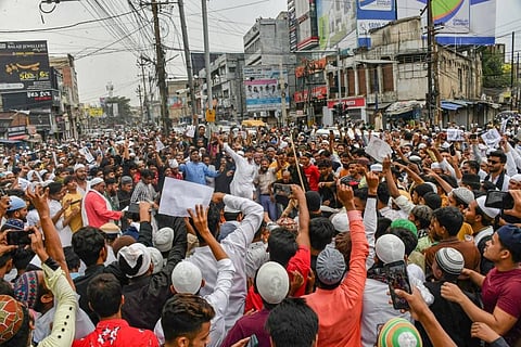 People from the Muslim community shout slogans during their protest over controversial remarks made by two now-suspended BJP leaders about Prophet Mohammad. (Photo | PTI)