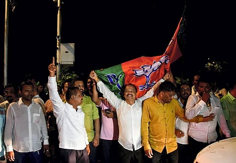 BJP leaders along with activists celebrate after the party won three Rajya Sabha seats from Maharashtra. (Photo | PTI)