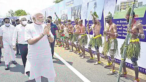 PM Modi arrives to inaugurate projects in tribal-dominated Navsari district | Express