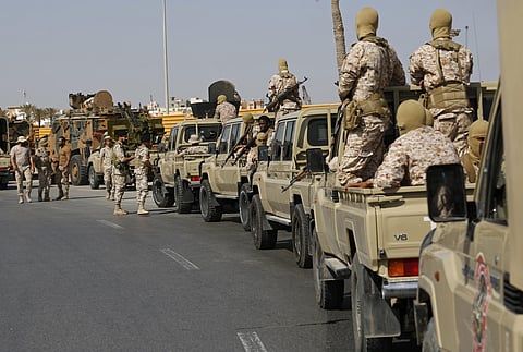 Forces loyal to Abdul Hamid Dbeibah, one of Libya's two rival prime ministers, secure the streets of the capital, Tripoli, on May, 17, 2022. (File Photo | AP)