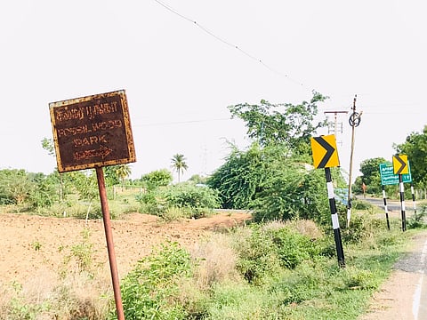 A rusted signboard directing to the national fossil park at Sathanur in Perambalur | Express