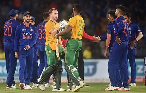 South African batsmen David Miller and Kagiso Rabada greet each other after the end of the second T20 cricket match between India and South Africa. (Photo | PTI)