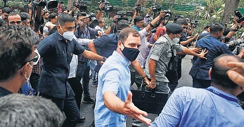 Congress leader Rahul Gandhi gestures as he leaves for the Enforcement Directorate’s office in New Delhi on Monday (Photo | Shekhar Yadav)