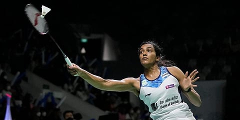 PV Sindhu competes against He Bing Jiao during their women's singles first round match at Indonesia Open badminton tournament at Istora Gelora Bung Karno Stadium in Jakarta. (Photo | AP)