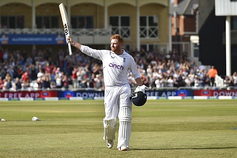 England's Jonny Bairstow raises his bat to acknowledge the applause from the crowd as he leaves the field after losing his wicket during the fifth day of the second Test. (Photo | AP)