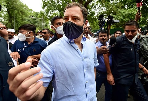 Congress leader Rahul Gandhi leaves for ED office amid protests by party workers, after being summoned for questioning in the National Herald case. (Photo | PTI)
