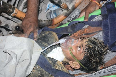 Rahul Sahu after he was successfully rescued, in Pihrid village of Janjgir-Champa district of Chhattisgarh. (Photo | PTI)