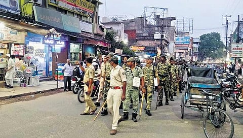 Police conducting flag march on Rourkela main road on Monday evening. (Photo| EPS)