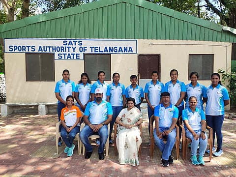 Indian rowing team (Standing: Rose Mastica Meril fourth from left) with RFI president Rajlaxmi Singh Deo (seated at the centre) and coaches. (Photo | Special Arrangment)