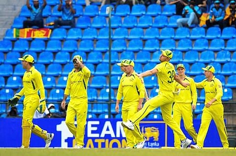 Australia's cricketers walk to the field before the start of the second one-day international (ODI) cricket match between Sri Lanka and Australia. (Photo | AFP)