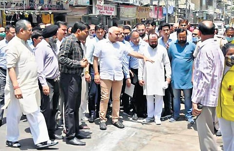 Deputy Chief Minister Manish Sisodia along with other senior officials inspects the Kamla Nagar Market on Wednesday. (Photo | EPS)