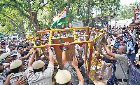 Congress workers protest Enforcement Directorate’s summoning of Rahul Gandhi, outside the party headquarters in Delhi on Wednesday | Shekhar Yadav