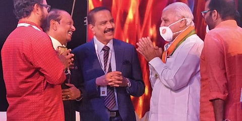 Governor greets Lulu Group chairman Yusuffali M A and Aster DM Healthcare chairman Azad Moopen at the inauguration of the third edition of Loka Kerala Sabha in Thiruvananthapuram on Thursday