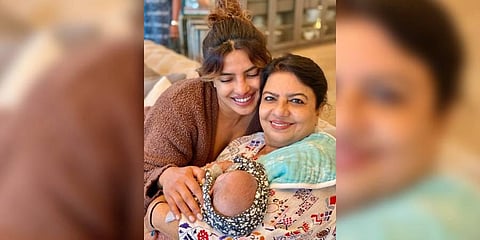 Priyanka was seen sitting with her mother and the latter holding Malti Marie. (Photo | Instagram)