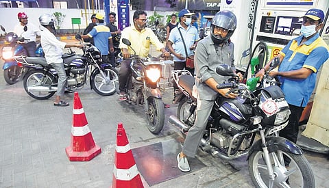 People queue up to fill petrol at a fuel station in Chennai. (Photo| R Satish Babu, EPS)
