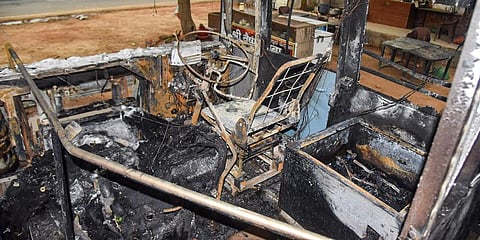 A burnt bus that was set on fire by people protesting against Centre's 'Agnipath' scheme. Image used for representational purpose only. (Photo | PTI)