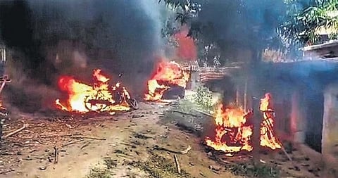 Vehicles set on fire in Masaurhi during the Bihar bandh on Saturday. (Photo | PTI)