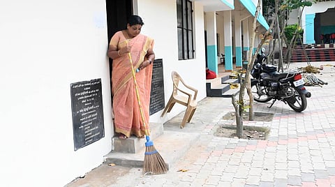 K R Usha Kumari sweeping the PSNM Government Higher Secondary School premises at Peroorkada in Thiruvananthapuram | Vincent Pulickal