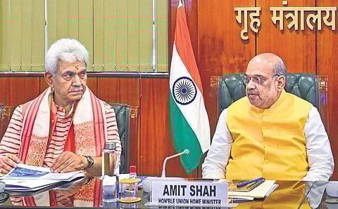 Union Home Minister Amit Shah and J&K Lieutenant Governor Manoj SinhaManoj Sinha at a meeting | PTI