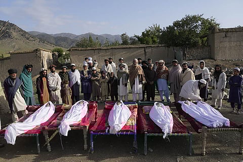 Men stand around the bodies of people killed in an earthquake in Gayan village, in Paktika province, Afghanistan. (Photo | AP)